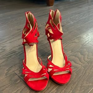 Gently worn red pumps